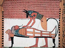 קובץ:250px-Anubis attending the mummy of Sennedjem.jpg